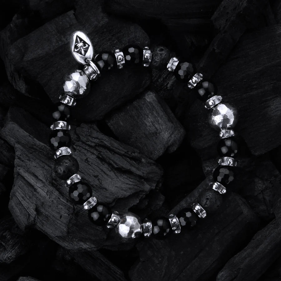 Armband aus Silber und Perlen mit FACETTIERTEN SILBERKUGELN auf Kautschuk